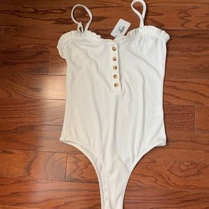 White ruffle bodysuit